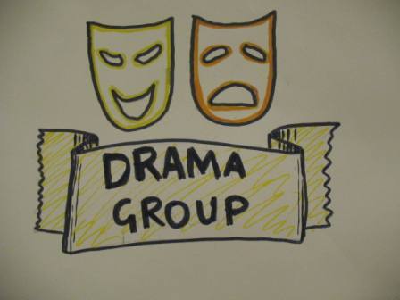 masks smiling and sad with drama group written under it